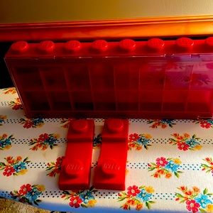 Like new red Lego figure holder